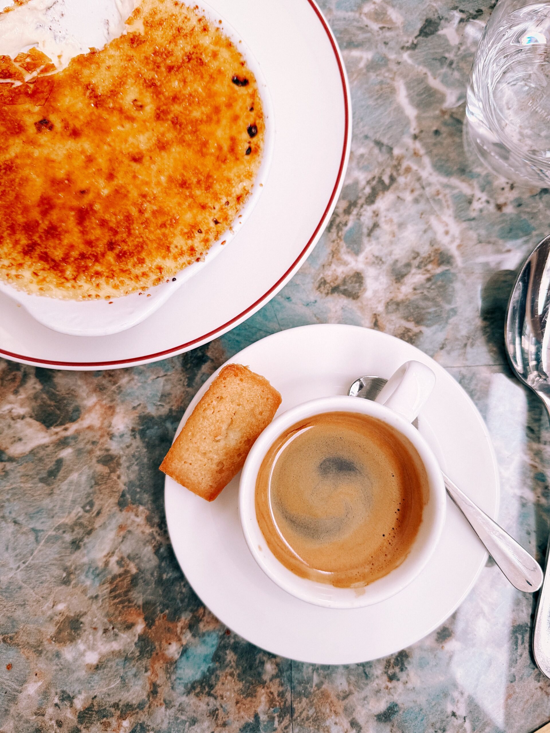 Espresso With a Financier Next to a Crème Brûlée