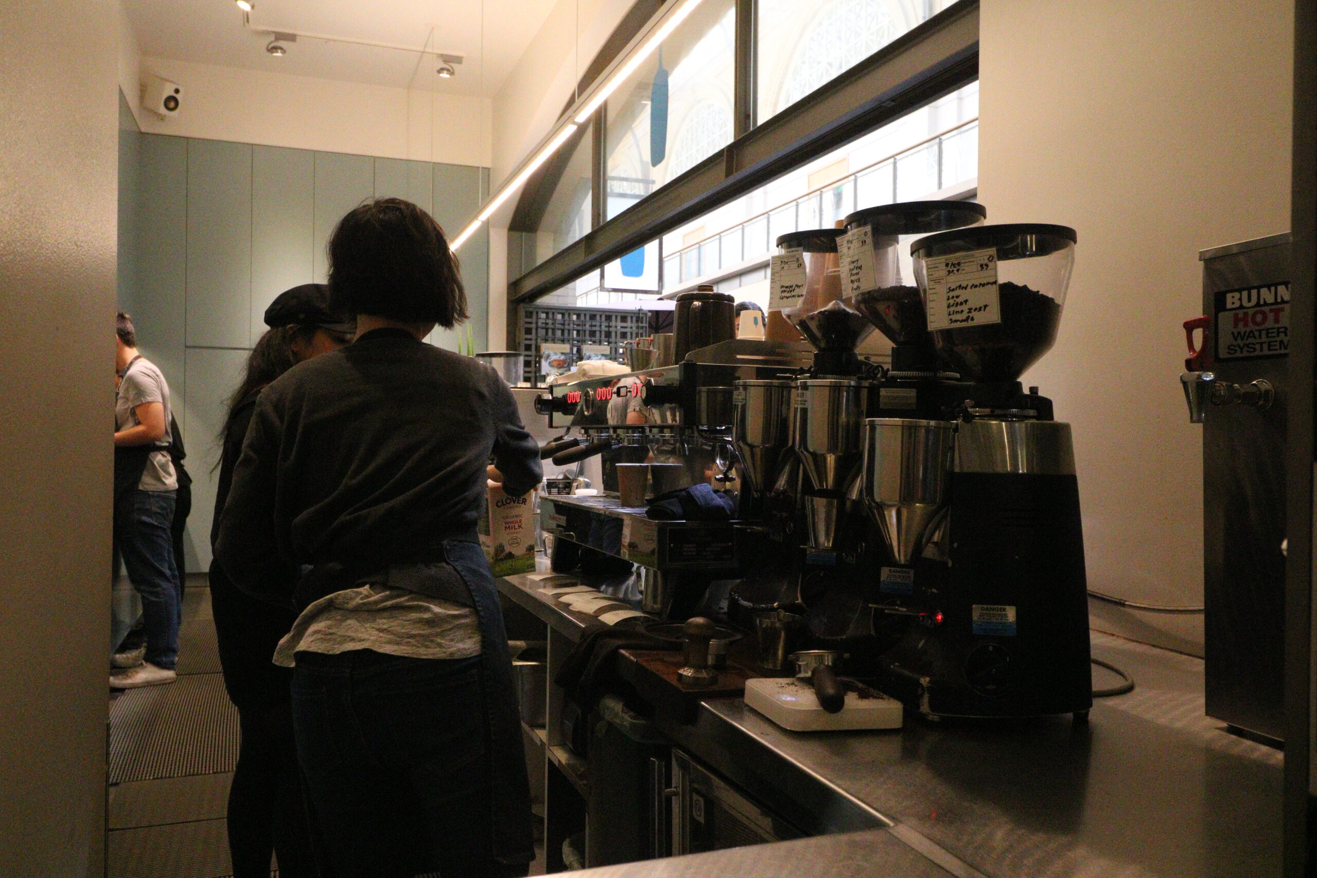 Baristas at a Blue Bottle Coffee Espresso Bar